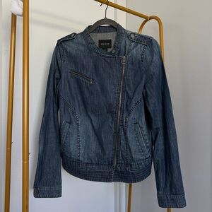 DKNY blue denim biker jacket with zipper details and pockets. Size: S